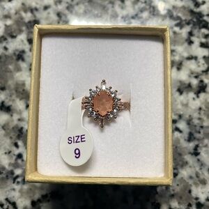 Rose Gold plated ring peach tourmaline infused with genuine quartz stone Size 9.